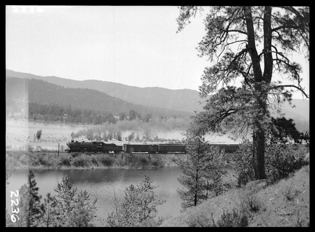 NP 2241, Class Q-5 pulling Train No. 2 west of Plains, MT.  Clark Fork River in foreground.