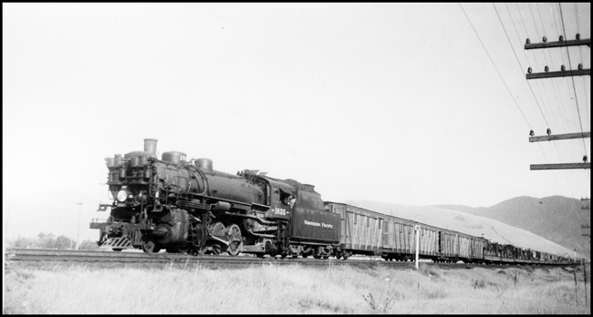 NP X1835W with 1835, Class W-5 pulling circus train outside of Missoula yard.