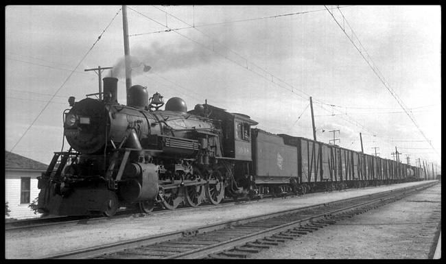 MILW 1008,4-6-0,  with Eastbound freight train on Gallatin Valley branch at Three Forks, MT.  