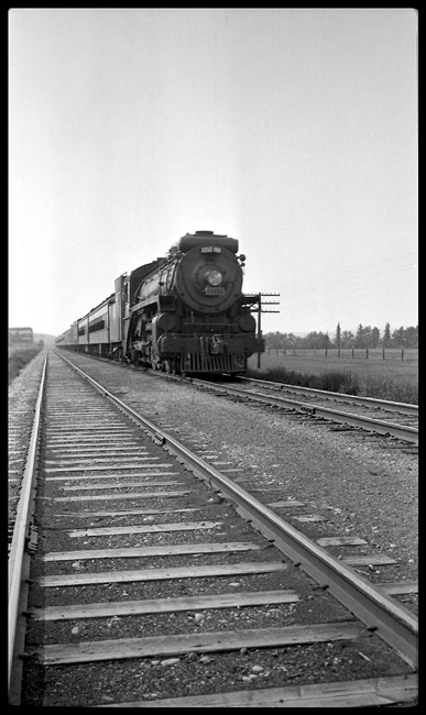 Num,ber 5 is running against the current of traffic on the double track west of Calgary