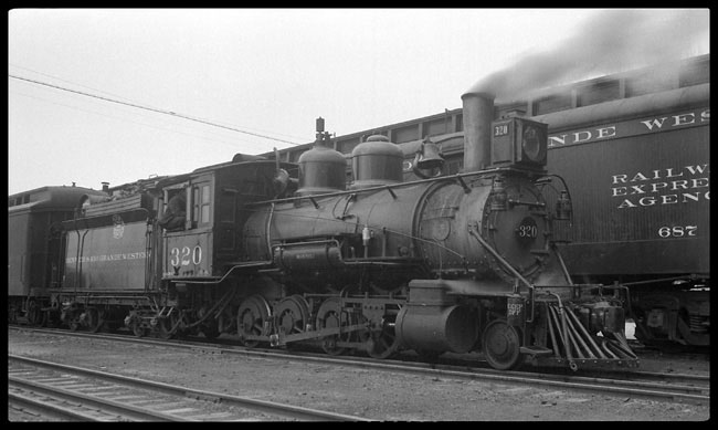 The full size train from Grand Junction is a big contrast to the Slida to Ouray passnger train at Montrose.  Its mid-afternoon, and most of the workday is over for the 320.   