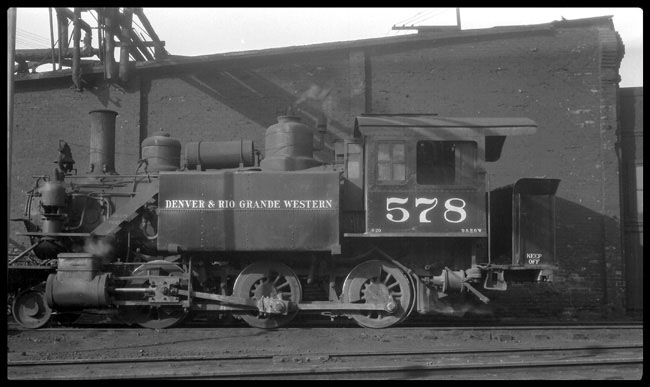 Many large roundhouses would be supplied with a cast off engine, rebuilt without tender and kept around to move engines undergoing repair and inspection.  Salt Lake City had this 1890 Baldwin, built for road service, and spending its last few years close to the roundhouse