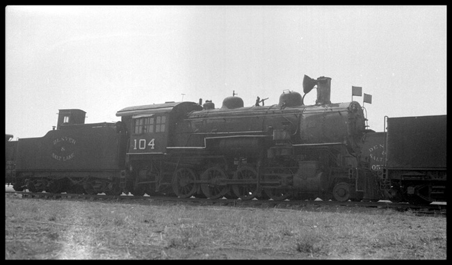 Beflagged and ready to go, a 2-8-0 on Denver's other mountain railroad, the Denver & Salt Lake waits at the Denver engine terminal