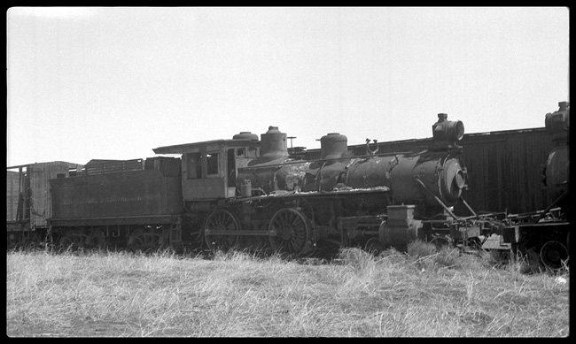 Some engines sat around for years in derelict condition after their owning railroad went out of business.  The Denver, Laramie & NorthWestern was a shortline in north central Colorado sugar country that should probably have never been built.  Some of its leftover engines, like this one, an 1889 Rhode Island 4-4-0 sat for years in a Denver junkyard