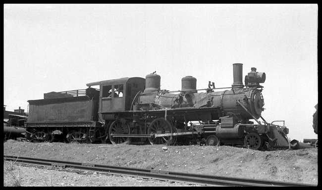 More than a few parts are missing from this 1888 Rome 4-4-0.  It has spent years in a Denver junkyard, and it will last for a few more years there.