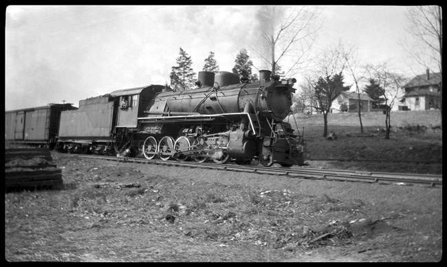 The Russian is coming.  A 2-10-0, ordered for the Czar and never delivered takes a drag freight on the Buffalo branch.  This engine was first assigned to the Southern, then went to the Erie, which seemed to like the orphans better then most roads did.