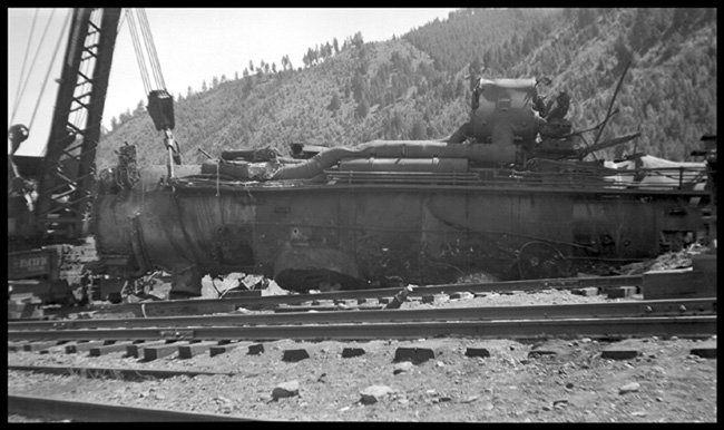 NP 5105 explosion  Willis, Mont. Same wreck as RVN01282. Views by M. W. Scott   Unidentified crane lifting inverted boiler section with smokebox and front cylinders