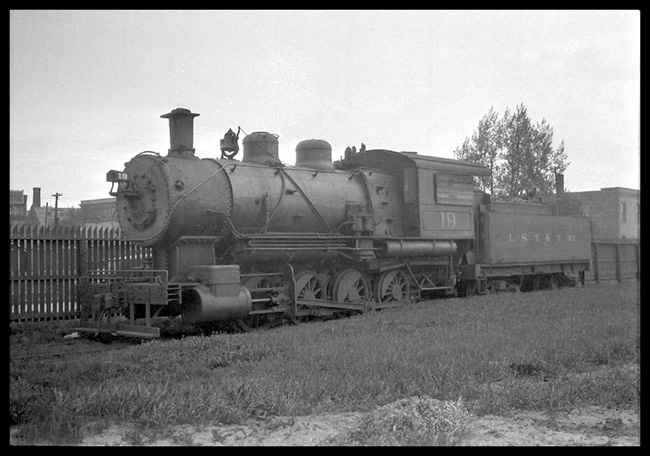 LST&T 10  Superior, Wisc  5/30 This appears to be a stored 0-8-0  LF view, by picket fence