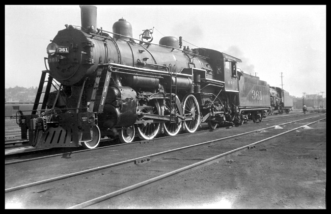 Missouri, Kansas and Texas 361  5/28 LF view of clean 4-6-2 and unidentified steam loco in bckgrnd on adjacent track