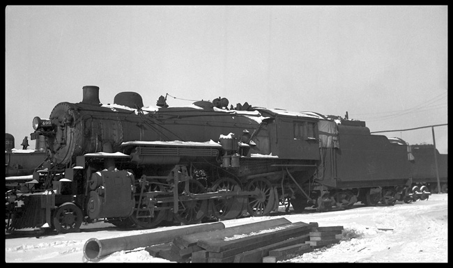 MSP&SSM 499  Superior Wisc 1/33 Minneapolis, St Paul and Sioux St Marie 2-8-0 stored  LF 3/4 view  Partial views of other stored locomotives