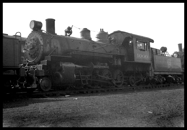 MSP&SSM  1000  Minneapolis  5/30  First Mikado built for U.S. Low angle LF view of historic Soo 2-8-2, first of its wheel arrangement in the US  Very small locomotive  Switcher pilot  Stored among other steam locomotives