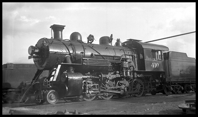 NC&SL 410  Chattanooga  Tenn 12/19/35 2-8-0  Stack is capped, but locomotive is in good condition and may not actually be in storage  Unusual appliance in front of and on top of stack
