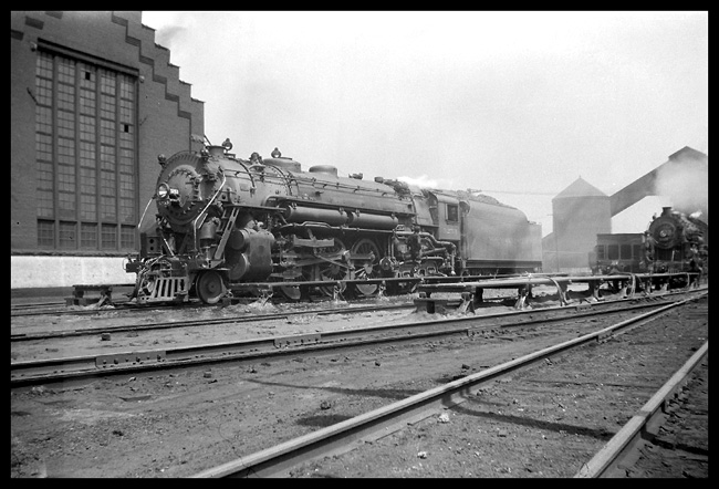 NYC 5253  Buffalo NY  5/28 Left side view of New York Central 4-8-2 on ready track  Second, unidentified locomotive on near track in bkgrnd