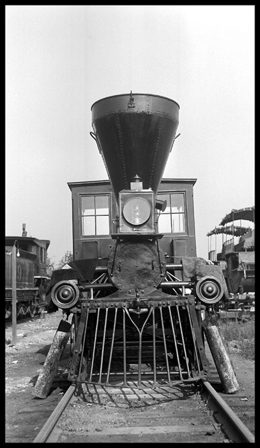 PRR Pioneer Front view  Chicago  9/34  Vertical format Head-on closeup of Pioneer, with cropped locomotives on adjacent tracks