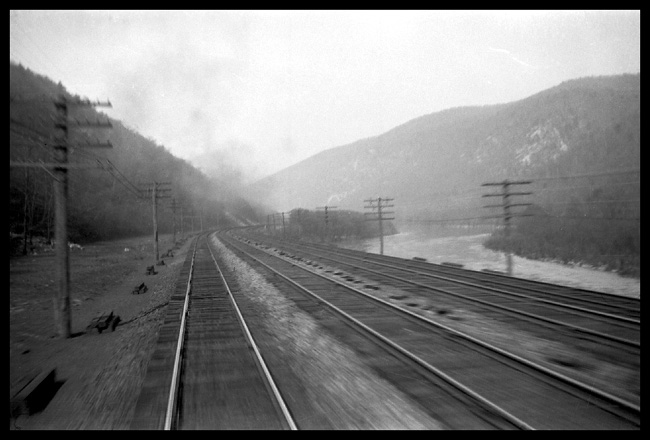 View of 4-track PRR main from rear of train at speed between Altoona and Harrisburg, PA.