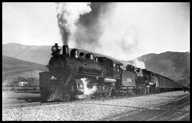 NP #1-1306-284 leavg Missoula about 1904  cy  Beebe Left front tight angle view of entire train, 4-6-0 class S-3 1306 [Schenectady, 1901] helping and road engine 4-6-2 class Q 284 [Alco, 1903, later renum 2084]  This is an early North Coast Limited  Note the older lettering style, with the engine number in large numerals on the tender of 1306