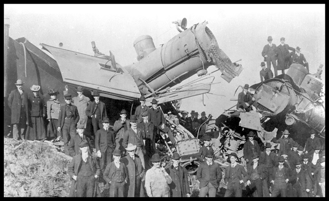 NP wreck  716 - 424  head-on  #12 and lite eng.  Baxter  Minn  10/22/02  cy  WRM About four dozen well-dressed men and three women are posed in front of, in the midst of and on top of the wreckage  Perhaps these are citizens of Baxter who have turned the wreck into a festive occasion!  Copy negative from Warren McGee  