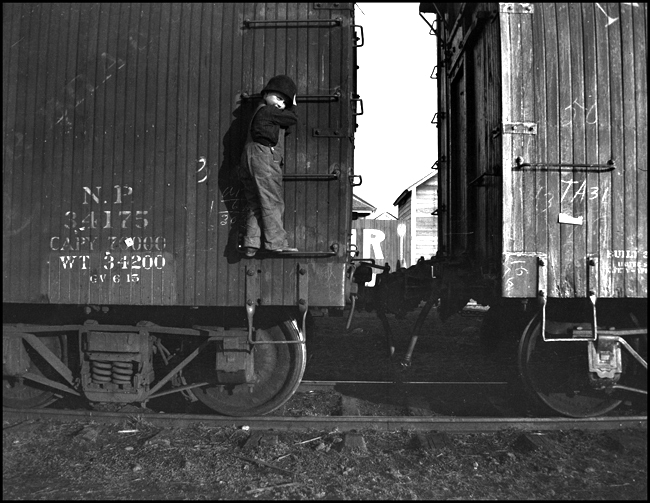 RVN  Roberts  1916 Nixon at a very young age is standing on the lower rung of the ladder on the right side of NP box car 34175  Nixon's caption may vary from the usual pattern, in that it is probable that 