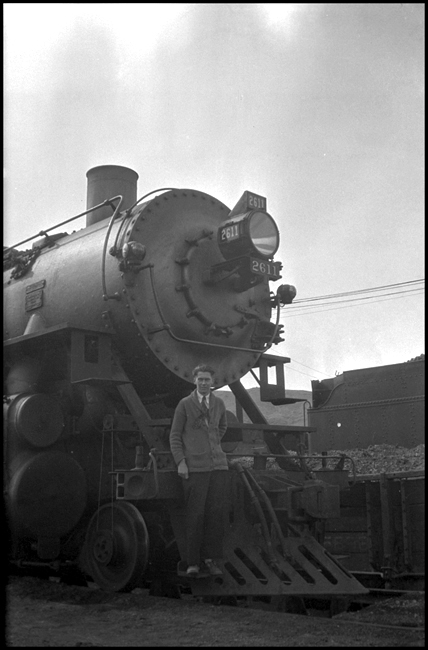 RVN  Livingston  1930 on NP 2611  Ron Nixon is standing on the pilot of the final member of class A 4-8-4s  Note how the pilot protrudes out to a sharp point.  These pilots were later replaced with ones that did not protrude as far out front This is the engine class that gave the name 