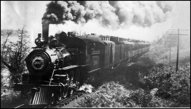 NP 300 OS on first North Coast Ltd  cy  VB  Engine 300 is a 4-6-0  Nixon's caption on this copy negative does not indicate a date or location  However the date of NCL inauguration is known, and the picture is widely believed to have been taken on the trackage alongside of the Columbia River between Portland and Goble, where the train would be put on a car ferry and be taken across the Columbia to Kalama on the Washington side  Nixon's use of 