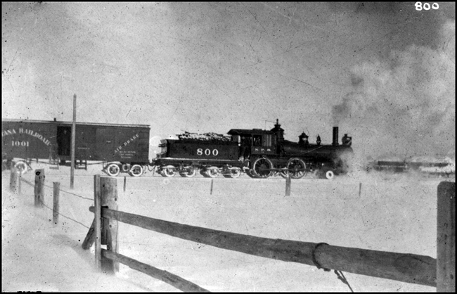 NP 800 on Montana Ry about 1900  copy negative from Cliff Garver  800 is a class C-6  4-4-0 built by Portland in 1883  The Montana Union Railway was controlled by NP  It connected to NP at Lombard, MT and worked its way from there up 16 mile canyon  It was popularly known as the 