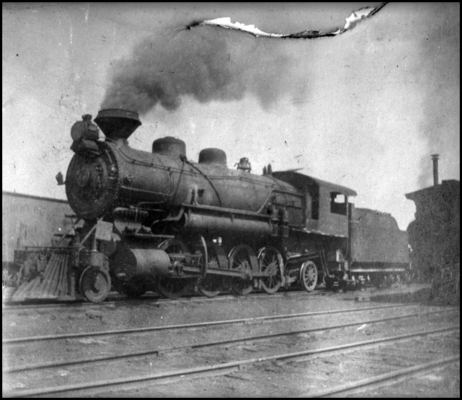 NP 1501 with diamond stack  Spokane  about 1904  Copy negative from Melberg  1501 is the second member of class W 2-8-2, a class of which NP had 160 engines  Built in Alco's Brooks works in 1904, 1501 and others were delivered with the diamond stack, but it was soon removed