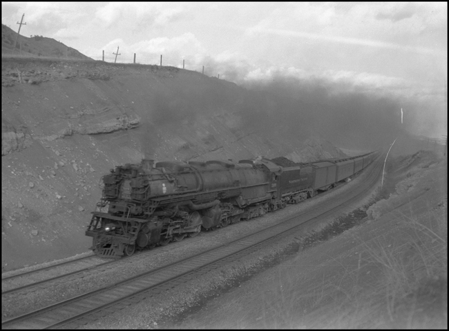 NP second #1  5109  near Muir  3-8-41 Train #1 is the west bound North Coast Limited from St Paul to Seattle, and business at the time must have been good, as this is the second section of the train.  It is being pulled by a class Z-6 4-6-6-4 built by Alco in 1937 at Schenectady  The men called them 
