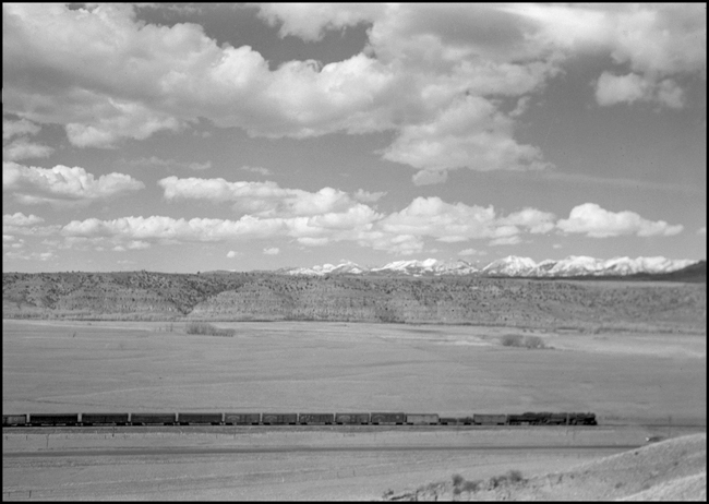 NP Extra 5104 West near Missoula K1 1/2  3-31-41.  The meaning of K1 1/2 is unknown to the cataloger  5104 is a class Z-6 4-6-6-4 built by Alco in 1937 at Schenectady.  The men mistakenly called them 
