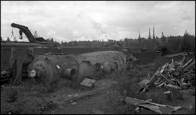 Closer view of boiler of NP 2239, Class Q-5 locomotive with 3rd #2 which derailed 1.5 miles east of Athol ID, probably caused by excessive speed.  Engineer and Fireman were killed. Because there was no room for the head brakeman on the engine, his life was spared as he was riding in the caboose at the rear. 