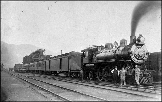 NP 283, 4-6-2 , Class Q locomotive that was renumbered to NP 2083 in 1915, with Train No. 41 probably in Missoula based on mountain in background. 