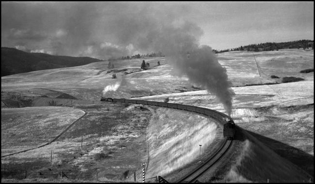 NP 2nd No. 1 with NP 2604, Class A near Nagos. Helper engine not identified.