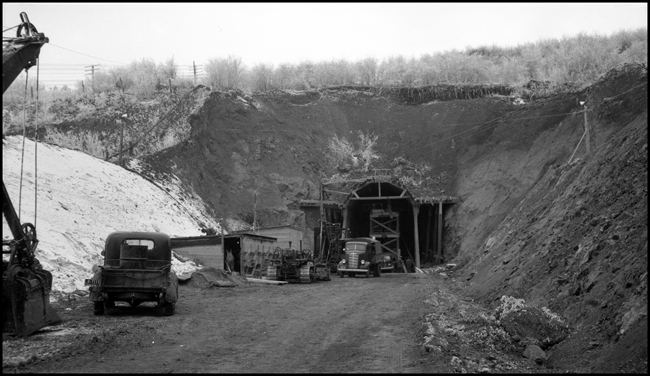View of construction of new Bozeman tunnel at East portal from Muir, MT .