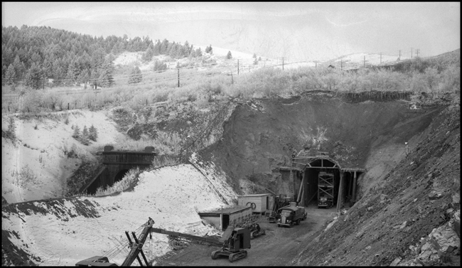 View of East portal of old Bozeman tunnel and construction of the east portal of new Bozeman tunnel at Muir, MT .