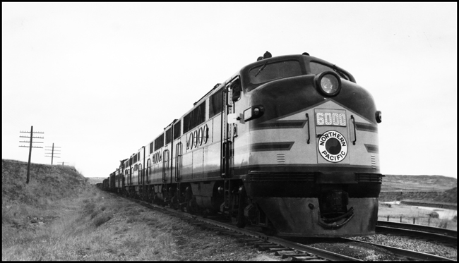 NP X6000E with NP Class FT DE 6000 on what appears to be a test train, with the dynamometer car behind the locomotive consist.