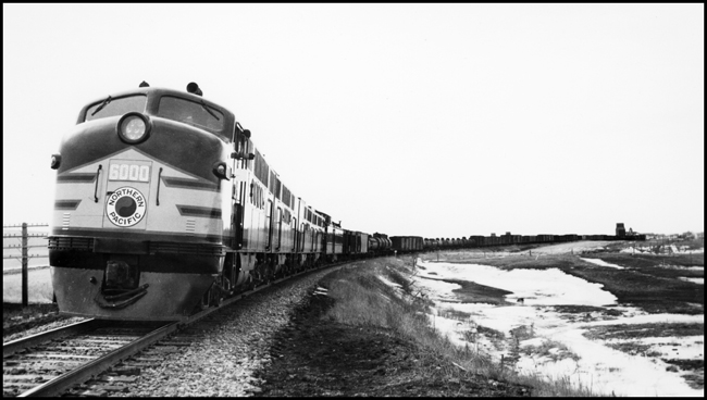 NP X6000E with NP Class FT DE 6000 on what appears to be a test train, with the dynamometer car behind the locomotive consist at Sentinel Butte.