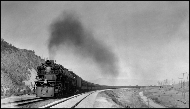 NP Psgr X5123E with NP 5123, Class Z-7 pulling 32 Pullman cars east of Missoula, MT.