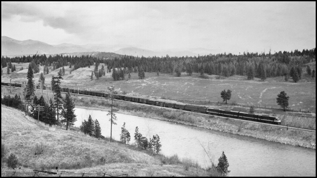 NP Train X6001W, with NP DE6001, Class FT locomotives coupled to NP 276 dynamometer car and the trailing freight train.