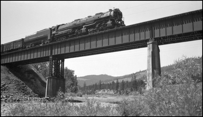 NP X5105E with NP 5105 Class Z-6, crossing bridge over Missoula River near Bonner