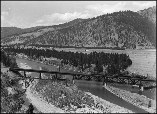 NP Train work X 1382, Class S-4 crosses bridge at Bonner