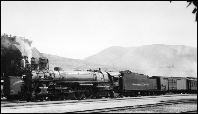 NP 2626, Class A-1, the Timken engine talking to train conductor at Missoula depot. 