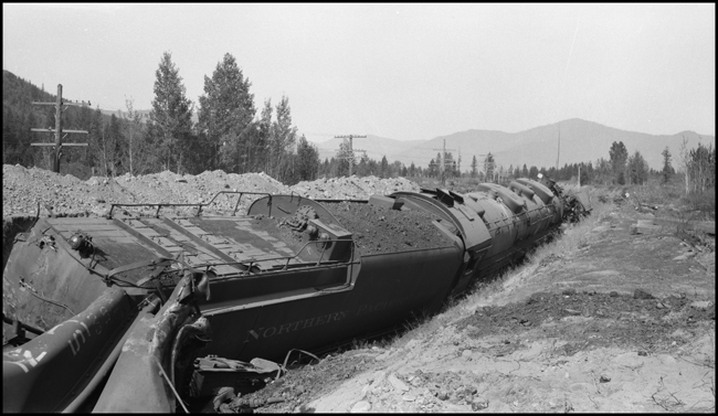 NP X5107E with NP 5107, Class Z-6 which was hauling a Banana Special when it went in the ditch just west of Trout Creek, due to a broken frame on engine 5107