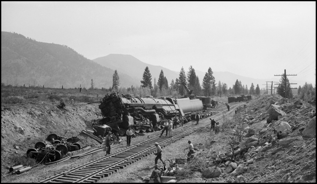 Rerailing NP 5107, Class Z-6 which was hauling a Banana Special when it went in the ditch just west of Trout Creek, due to a broken frame on engine 5107.