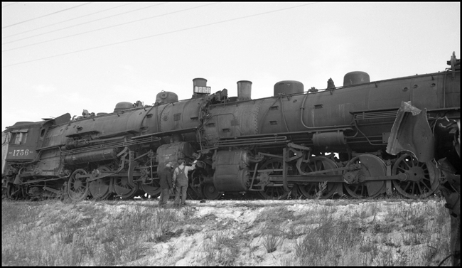 Head-on collision between NP X1756E and X1837W, Harmon, ND. Crew of X1756E failed to observe meet; fireman Rogers killed.