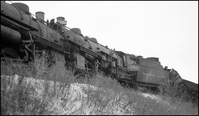 Head-on collision between NP X1756E and X1837W, Harmon, ND. Crew of X1756E failed to observe meet; fireman Rogers killed.