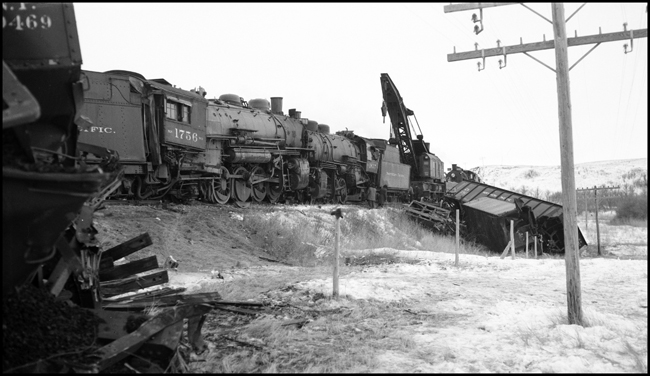 Head-on collision between NP X1756E and X1837W, Harmon, ND. Crew of X1756E failed to observe meet; fireman Rogers killed.