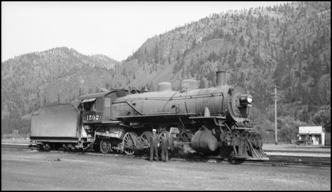 NP 2-8-2 loco. No. 1592 and crew, unspecified location.