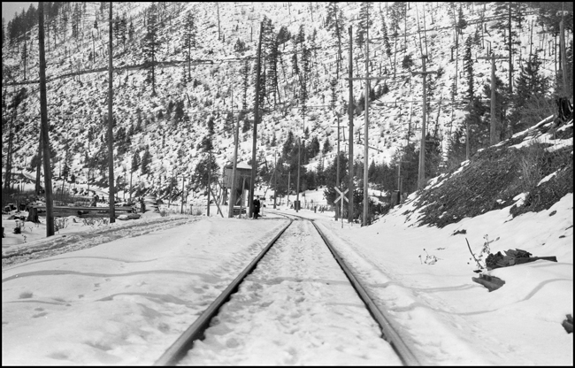 NP track, water tank, grade crossing, Larson, ID.