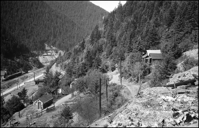 Panorama of NP track, town, valley, Burke, ID