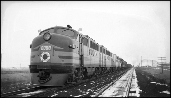 NP freight X6008W with new FT diesel, near GN Crossing, MT. Crew: Lindquist, Gartman, Sullivan.