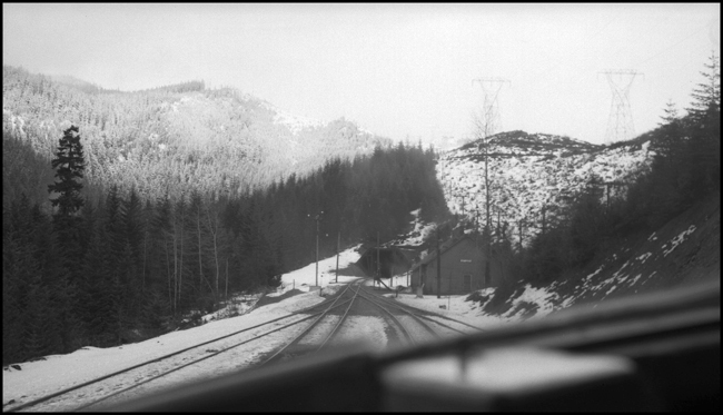 Looking down track from cab of new FT freight diesel 6003 on X6003E approaching New Stampede, WA.